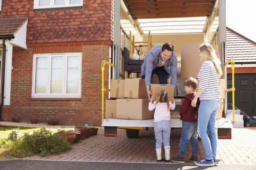 Professional packing services in Turnpikelane preparing boxes for a home move