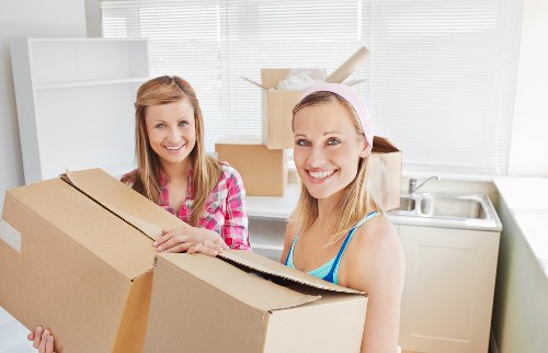 Packed household storage unit in Turnpikelane with labeled boxes and furniture